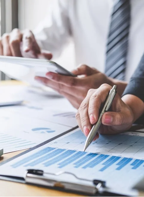 People reviewing business figures
